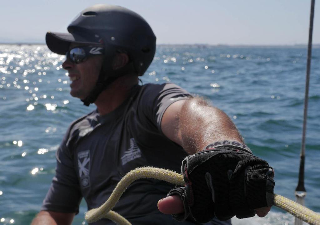 Trimmer James Dagg onboard Emirates Team New Zealand sailing on Day 1 of the Extreme Sailing Series Act 2 in Muscat, Oman. © Emirates Team New Zealand http://www.etnzblog.com