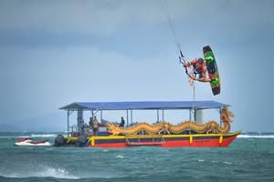 Jaka Komocar goes huge in freestyle action during final day - KTA Philippines Boracay Extreme 2014 photo copyright Alexandru Baranescu taken at  and featuring the  class