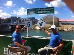 Mike Disch and Che Decastro, partners at The Yacht Shop, claim to be impartial with their scoring photo copyright The Yacht Shop http://yachtshopsxm.com taken at  and featuring the  class