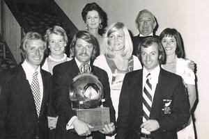 Terry McDell with the trophy, Peter Brook (left) and Kim McDell, their wives, manager Roy and Pat McDell photo copyright SW taken at  and featuring the  class