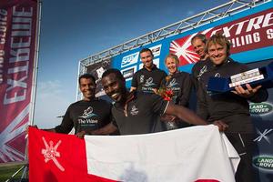 The Wave, Muscat on the podium - 2014 Extreme Sailing Series Act 2 photo copyright Lloyd Images taken at  and featuring the  class