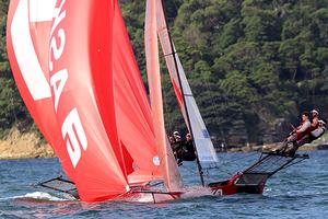 The critical moment when Asko Apliances grabbed the lead from Gotta Love It 7 - 2014 JJ Giltinan 18ft Skiff Championship photo copyright Frank Quealey /Australian 18 Footers League http://www.18footers.com.au taken at  and featuring the  class