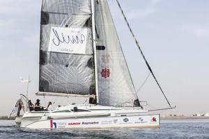 Hilary Lister British quadriplegic sailor( paralysed from the neck down) and Nashwa Al Kindi (OMA) shown here finishing their trans-ocean crossing from Mumbai - Muscat. Oman. Onboard a specially adapted Dragonfly trimaran photo copyright Lloyd Images taken at  and featuring the  class