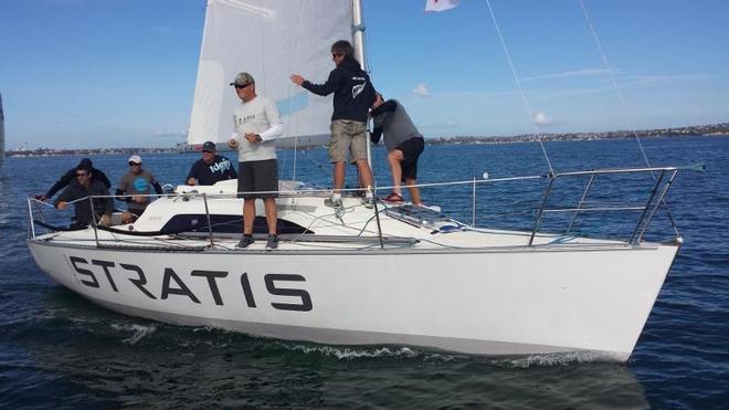 Jeremy Lomas and crew come alongside the committee boat prior to the start of racing on Day 2 2014 Harken Young 88 Nationals © RNZYS Media