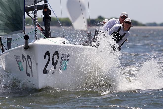 The best sailors use their body weight to constantly adjust the balance of the boat as this Melges 24 team demonstrates on a speedy downwind leg. © Meredith Block/ Charleston Race Week http://www.charlestonraceweek.com/