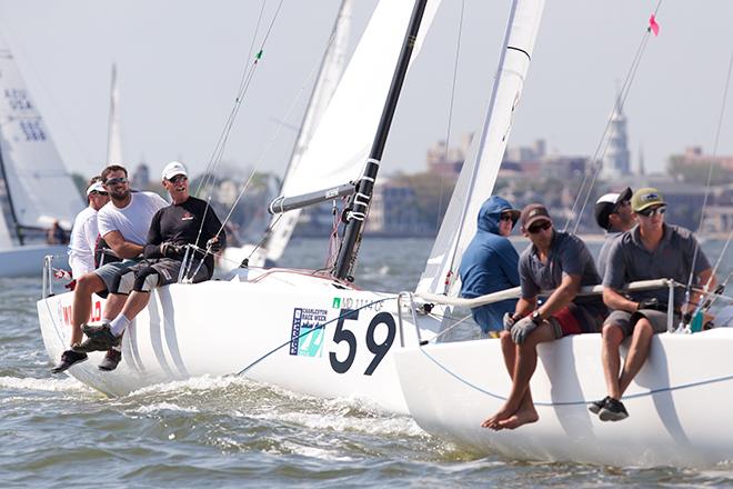 Wild Child (Annapolis, MD) chases down a competitor with America’s Cup veteran Moose McClintock (black shirt) intent on his prey. © Meredith Block/ Charleston Race Week http://www.charlestonraceweek.com/