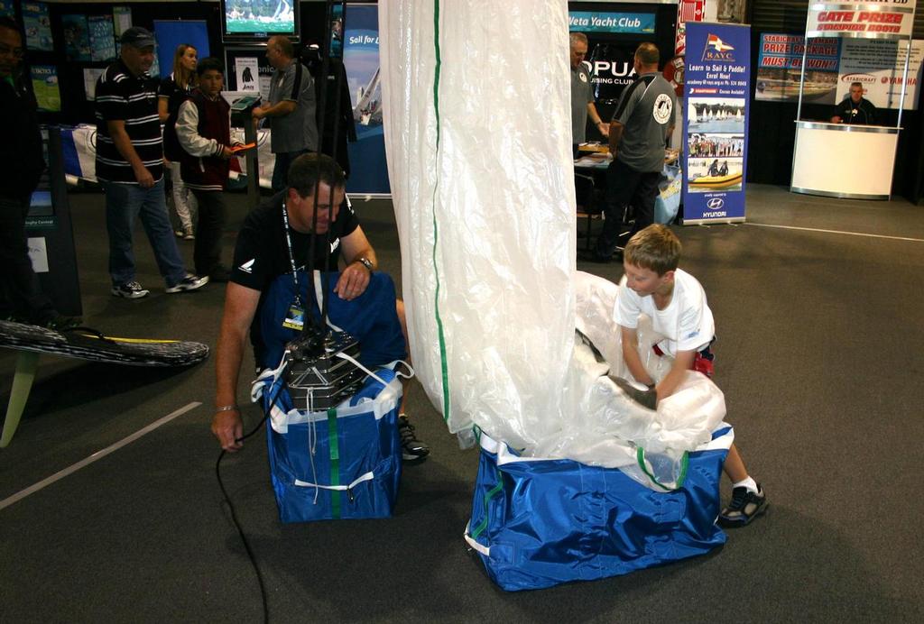 Dropping on the North Sails and Harken NZ hoisting game - 2013 show © Miranda Powrie