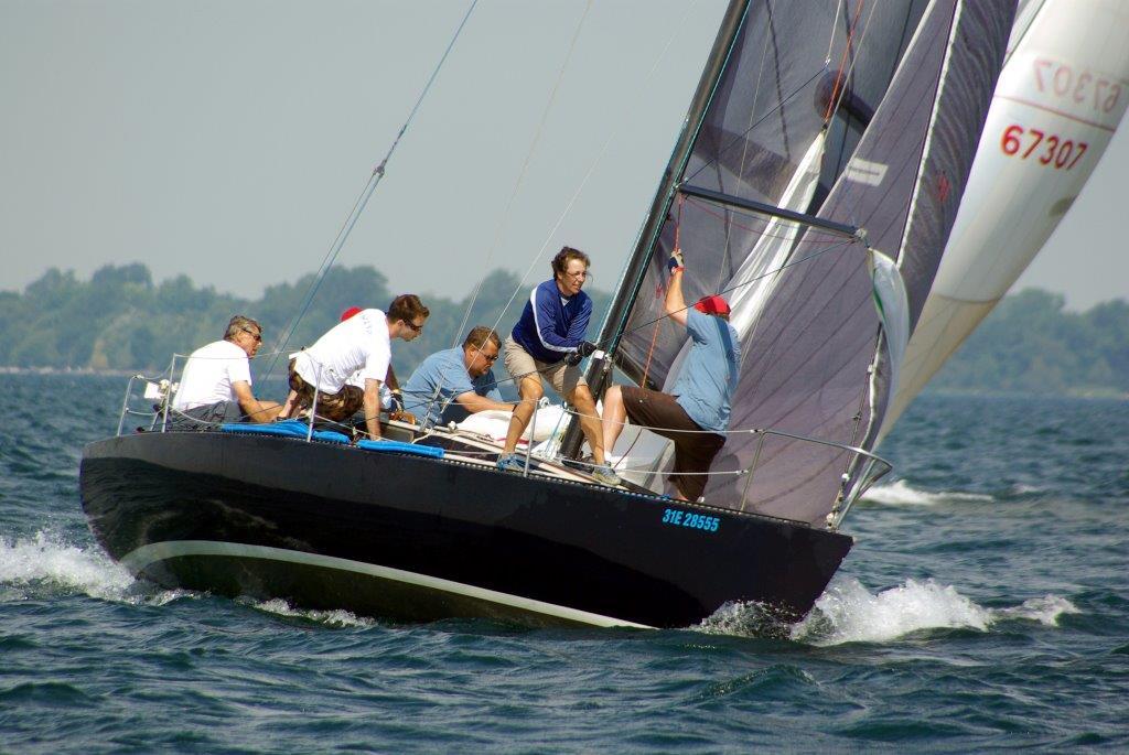 John Osborn helming Olson 30 Wreaking Crew © SW