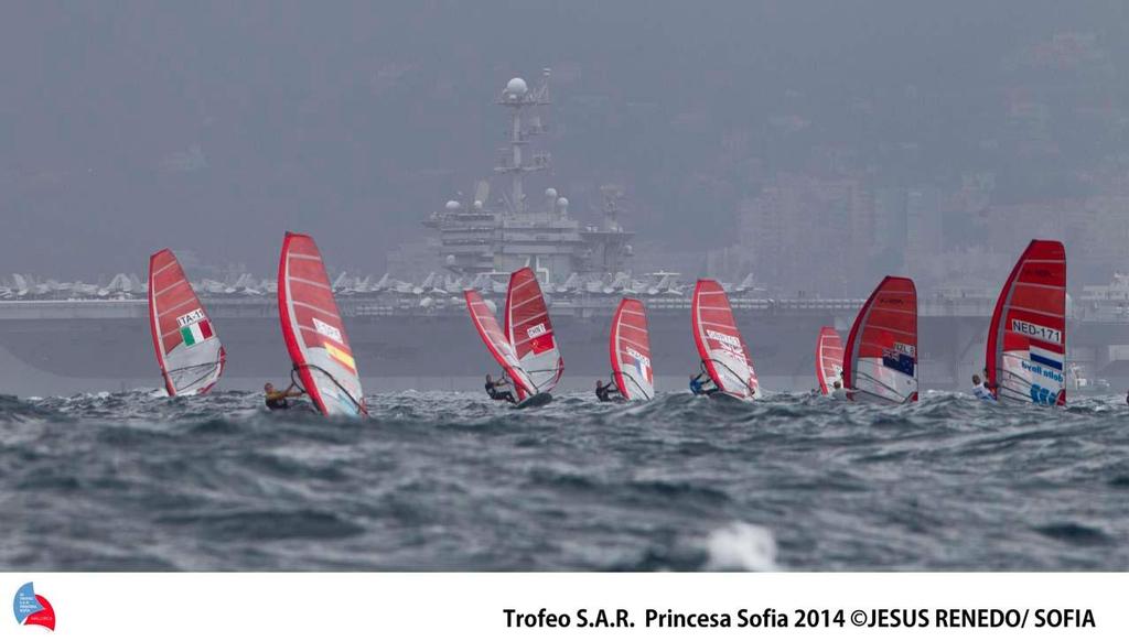 US military air carrier Harry S. Truman and the RS:X fleet - ISAF Sailing World Cup Mallorca day 4 ©  Trofeo S.A.R. Princesa Sofia / Jesus Renedo http://www.trofeoprincesasofia.org/