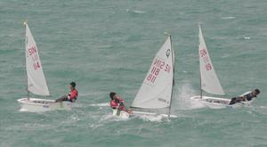 Singapore's Optimist sailors racing against highly competitive teams at the 2014 IODA Asian Optimist Championships photo copyright SingaporeSailing taken at  and featuring the  class