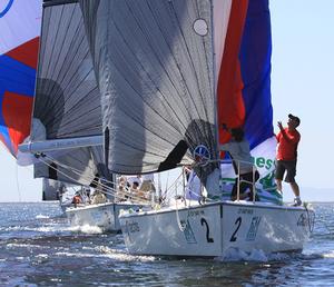 Skip Allan's crew prepares to drop the spinnaker  - The Congressional Cup photo copyright Rich Roberts taken at  and featuring the  class