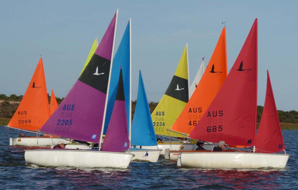 Close racing at the top mark in the 303 single-person division - Australian Hansa Class Championships 2014 photo copyright Australian Hansa Class Association taken at  and featuring the  class