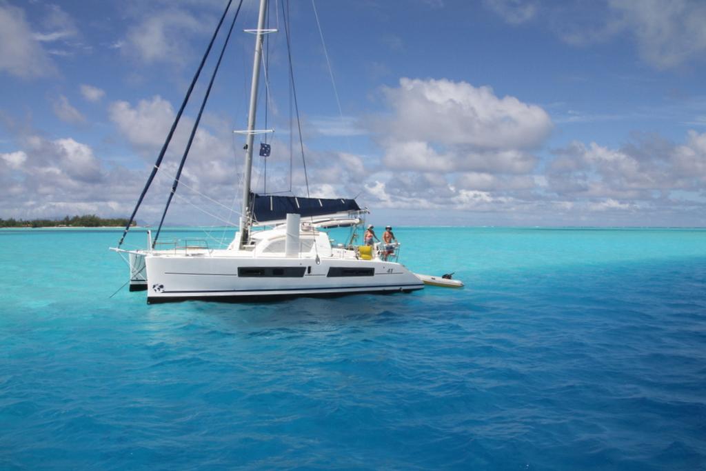 Anchored in Bora Bora Lagoon - Sail Tahiti Yacht Rally photo copyright Maggie Joyce taken at  and featuring the  class