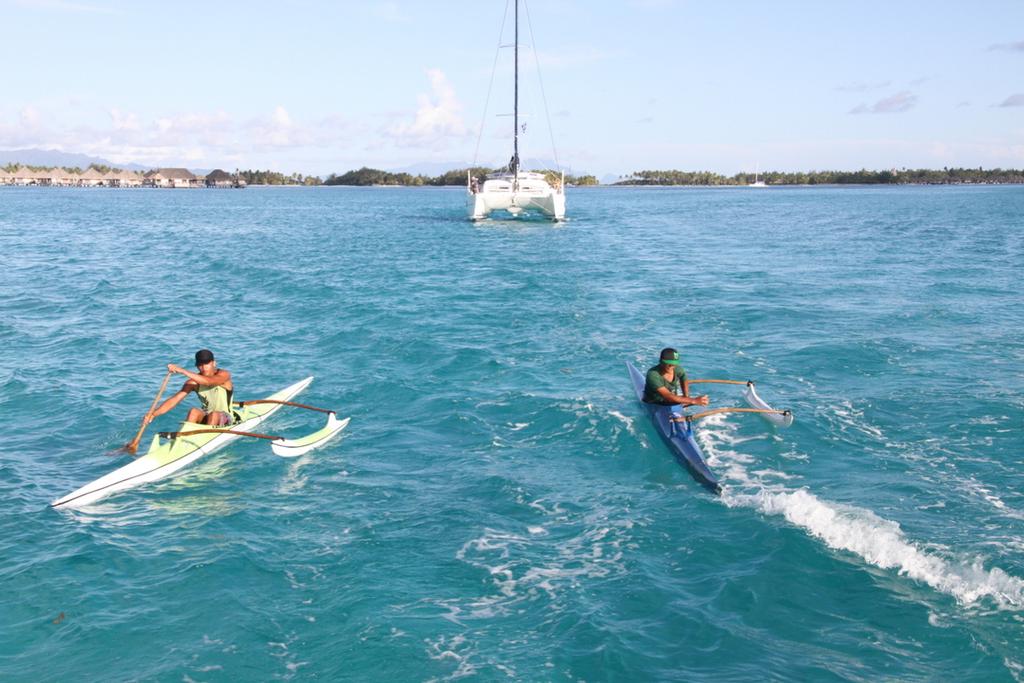 Hitching a ride is a local habit - Sail Tahiti Yacht Rally photo copyright Maggie Joyce taken at  and featuring the  class