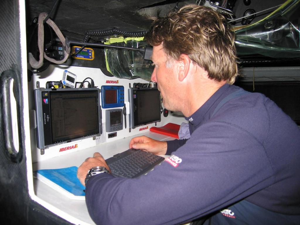 Navigator Andrew Cape  at the media station below decks on Volvo Open 70 movistar day 5 Leg 2 from Cape Town to Melbourne.

©Pepe Ribes photo copyright Volvo Ocean Race http://www.volvooceanrace.com taken at  and featuring the  class