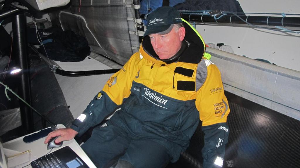 Andrew Cape at the navigation station onboard Team Telefonica during leg 9 of the Volvo Ocean Race 2011-12, from Lorient, France to Galway, Ireland. (Credit: Diego Fructuoso/Team Telefonica/Volvo Ocean Race) photo copyright Volvo Ocean Race http://www.volvooceanrace.com taken at  and featuring the  class