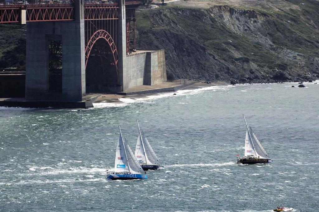 OneDLL, Old Pulteney and Henri Lloyd pass below the Golden Gate Bridge during the start of race 11 in the 2013-14 Clipper Round the World Yacht Race. photo copyright Chuck Lantz http://www.ChuckLantz.com taken at  and featuring the  class