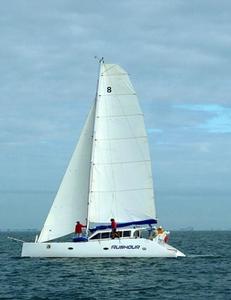 Don't underestimate this little cat with Drew Carruthers at the helm - APC Logistics MYCQ 50th Brisbane to Gladstone Yacht Race photo copyright Jules Geldard taken at  and featuring the  class