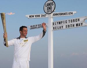 Ready to start: Triple Olympic champion sailor Ben Ainslie sets off from Land's End as the torch relay gets under way - London 2012 Olympics photo copyright Chris Radburn taken at  and featuring the  class