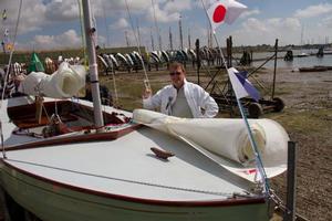 Owner Alan Hicks celebrates the launching of BOD C54 Storm Petrel photo copyright Tim Bees taken at  and featuring the  class