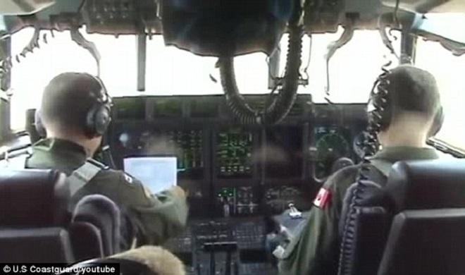 Preparation: The crew of a U.S Coast Guard Hercules make last-minute checks before setting off to search for the missing British sailors.  © U.S Coast Guard/Youtube