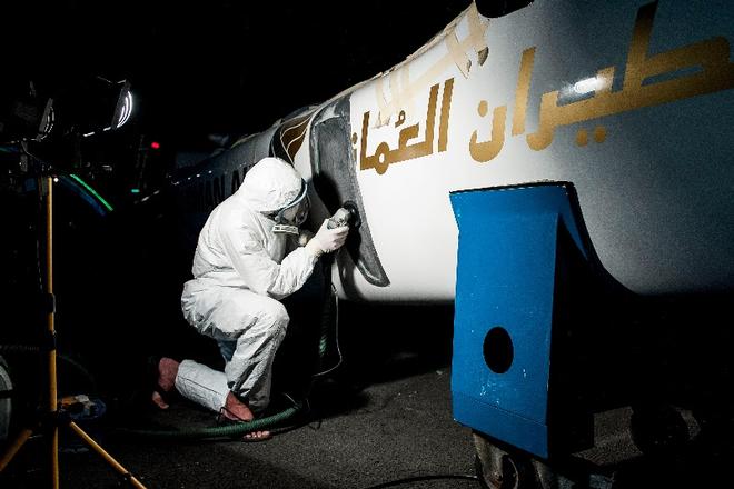 The Oman Air Shore Team worked through the night repairing the damage to their Extreme 40 ©  Xaume Olleros