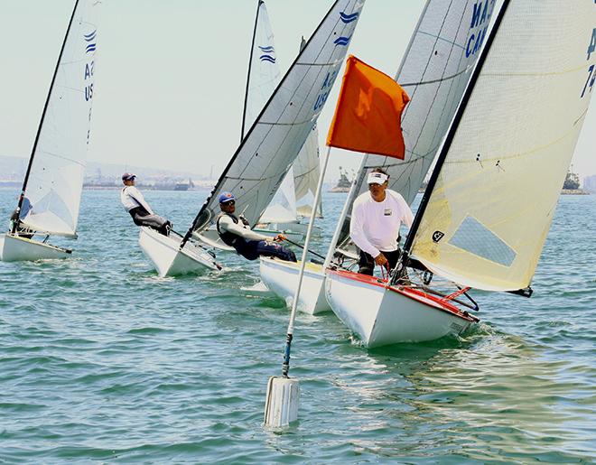 Henry Sprague leads the fleet off the start line - Finn Class North American Championships 2014 © Rich Roberts