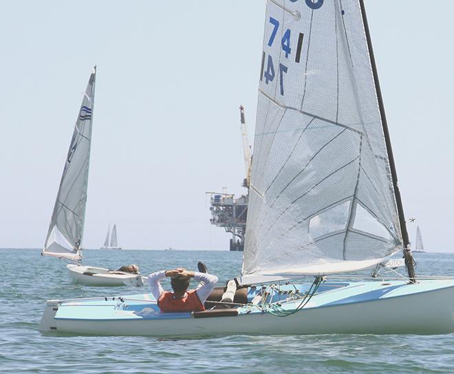 Andy Kern patiently waits for the wind that never arrived  - Finn Class North American Championships 2014 © Rich Roberts