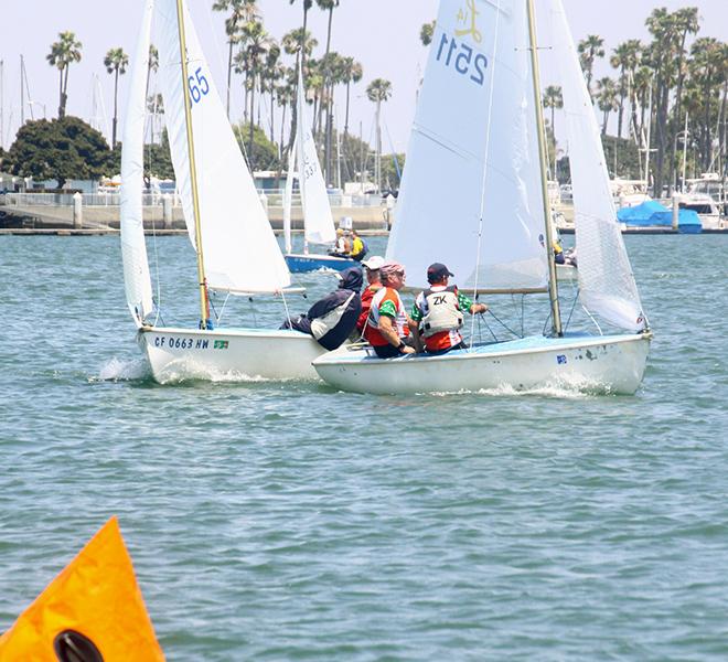 Stu Robertson (r.) crosses  Lido 14 rival Bruce Golison on way  to close win in Lido 14-A class  - ABYC Memorial Day Regatta 2014 © Rich Roberts