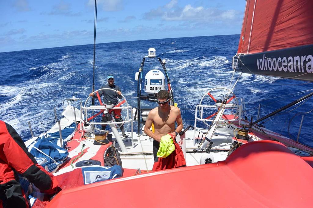 French Sailors Eric Peron and Thomas Rouxell enjoy a rare moment of calm and sunshine on deck © Dongfeng Race Team