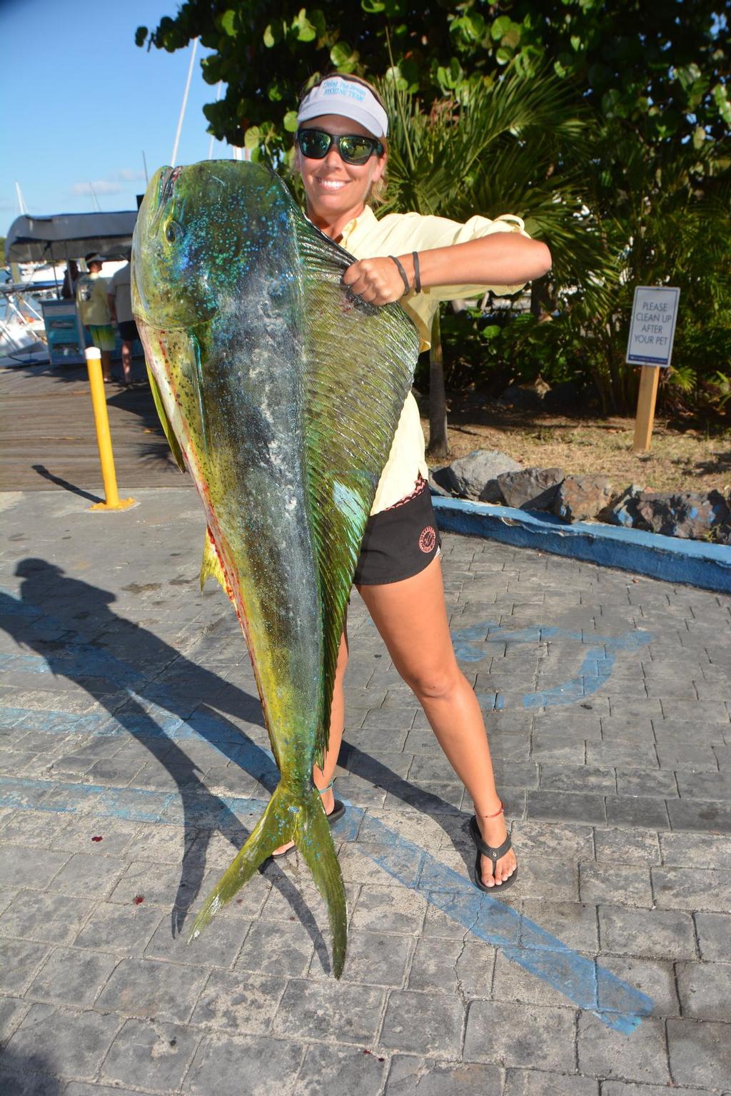 St. Croix, USVI's angler Beth Basinski boats the winning 35.3-pound dolphin (mahi-mahi). Credit: Dean Barnes - VIGFC Dolphin Derby photo copyright Dean Barnes taken at  and featuring the  class