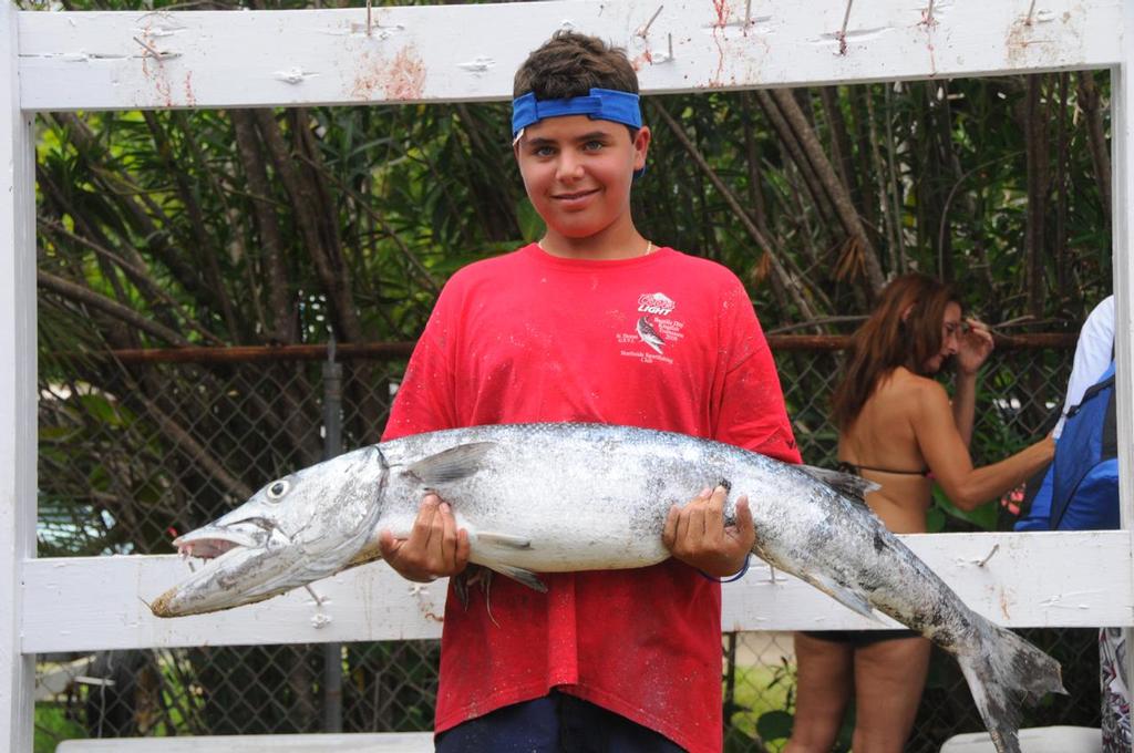 13-year-old Joshua Laplace weighed in a 31.46-pound barracuda, which set a new tournament record in 2013.  © Dean Barnes