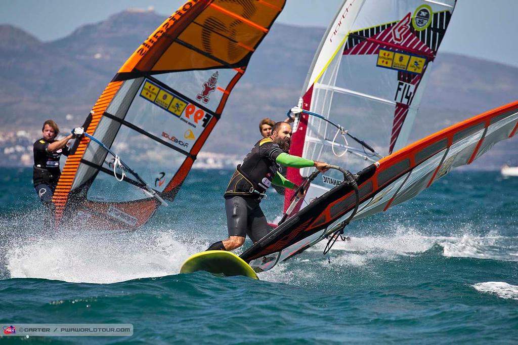 Buzianis cranks a gybe - 2014 PWA Catalunya World Cup, Day 5 photo copyright  Carter/pwaworldtour.com http://www.pwaworldtour.com/ taken at  and featuring the  class