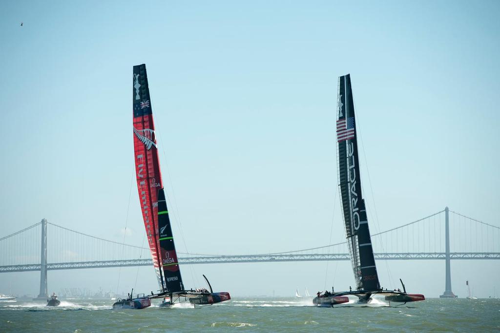 The most telling image of the 34th America’s Cup - Oracle Team USA have their boat foiling perfectly upwind and sailover Emirates Team New Zealand on the beat in race 18.  America’s Cup 34.  © Chris Cameron/ETNZ http://www.chriscameron.co.nz