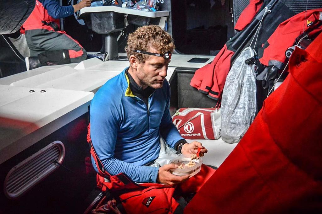 Skipper Charles Caudrelier appreciates the freeze dried food onboard as Dongfeng cross the Atlantic © Dongfeng Race Team
