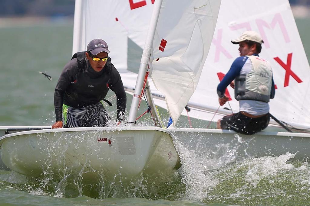 Jasiel Paredes of Nuevo Leon competes with Ander Belausteguigoitia of Hidalgo during the National Olympic Sailing race tournament at Avandaro lake on May 4, 2014 in Valle de Bravo, Mexico. © Hector Vivas/LatinContent/Getty Images