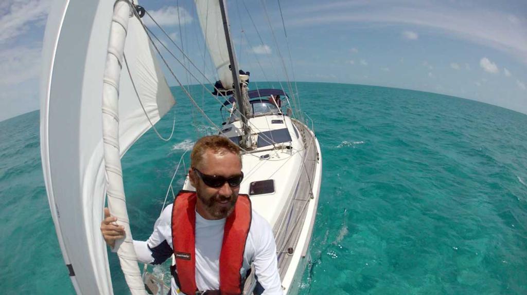 Paul wearing polarized glasses to reduce the glare on the surface of the water so he can see reefs and shoals better. © Paul Shard