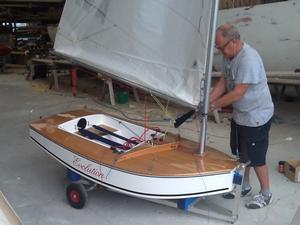 Ray Barker rigging Evolution after restoration photo copyright Ray Barker taken at  and featuring the  class
