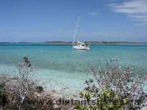 The differing shades of blue are indicators of the depth of the water. photo copyright Paul Shard taken at  and featuring the  class