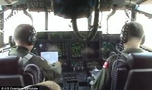 Preparation: The crew of a U.S Coast Guard Hercules make last-minute checks before setting off to search for the missing British sailors. - Has the Cheeki Rafiki been found? Debris spotted by volunteers in Atlantic near where yacht carrying British sailors disappeared photo copyright U.S Coast Guard/Youtube taken at  and featuring the  class