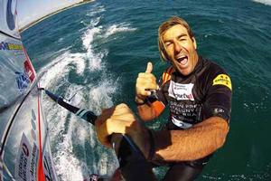 Antoine Albeau celebrates victory at the 2014 PWA Catalunya World Cup Â© Carter/pwaworldtour.com photo copyright  Carter/pwaworldtour.com http://www.pwaworldtour.com/ taken at  and featuring the  class