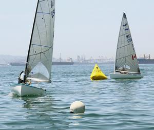 Chuck Rudinsky leads fleet to the offset mark in 2nd race - Finn class North American Championships 2014 photo copyright Rich Roberts taken at  and featuring the  class