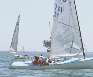 Andy Kern patiently waits for the wind that never arrived  - Finn class North American Championships 2014 photo copyright Rich Roberts taken at  and featuring the  class