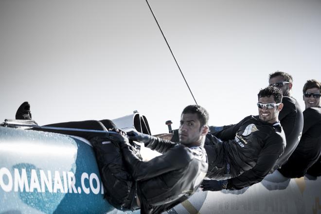 The Extreme Sailing Series 2014. Act 2. Muscat. Oman Air skippered Rob Greenhalgh (GBR) with headsail trimer Will Howden (GBR), trimer Tom Johnson (AUS), bowman Hashim Al Rashdi (OMA) and bowman Musab Al Hadi (OMA). © Lloyd Images