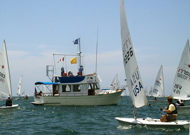 Race committee and racers wait for the wind to settle down  © Rich Roberts