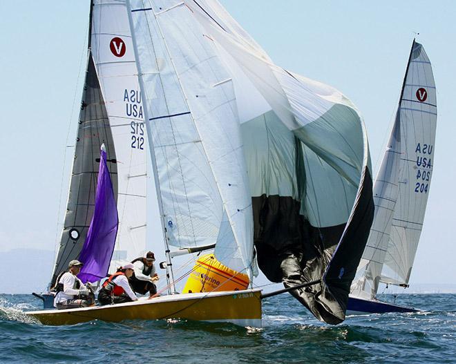 Craig Walker's Viper crew scrambles to set spinnaker © Rich Roberts