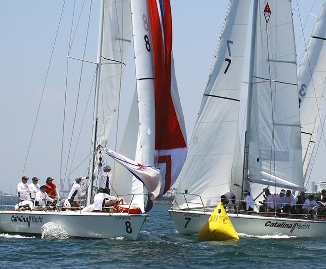 Melges 20s of Elliott James (l.) and  Skip Shapiro meet at leeward gate  © Rich Roberts