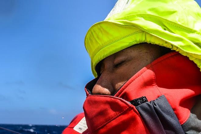 Kong Chen Cheng enjoys a quick break on deck.  © Dongfeng Race Team