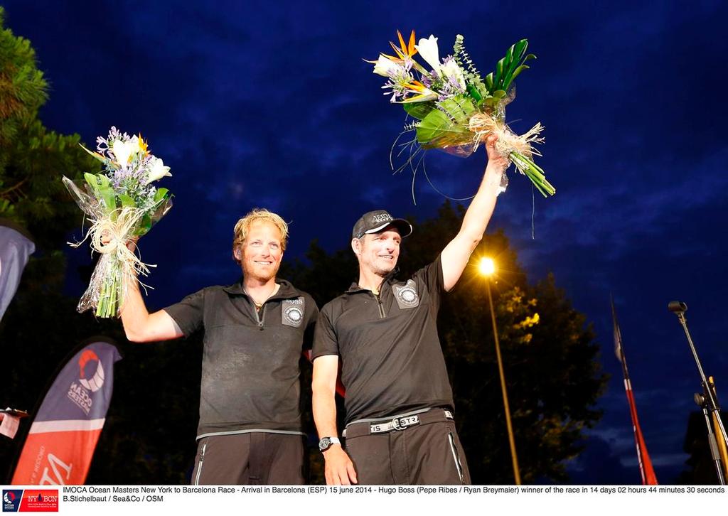 Arrival in Barcelona (ESP) 15 June 2014 - Hugo Boss (Pepe Ribes - Ryan Breymaier) winner of the race in 14 days 02 hours 44 minutes 30 seconds -  IMOCA Ocean Race Masters New York to Barcelona 2014 © B.Stichelbaut / Sea&Co