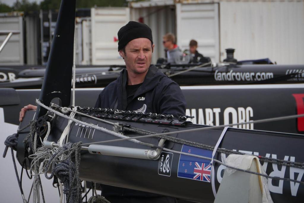 Richard Meacham rigging the boat prior to it going in the water in St Petersburg, Russia © Hamish Hooper/Emirates Team NZ http://www.etnzblog.com